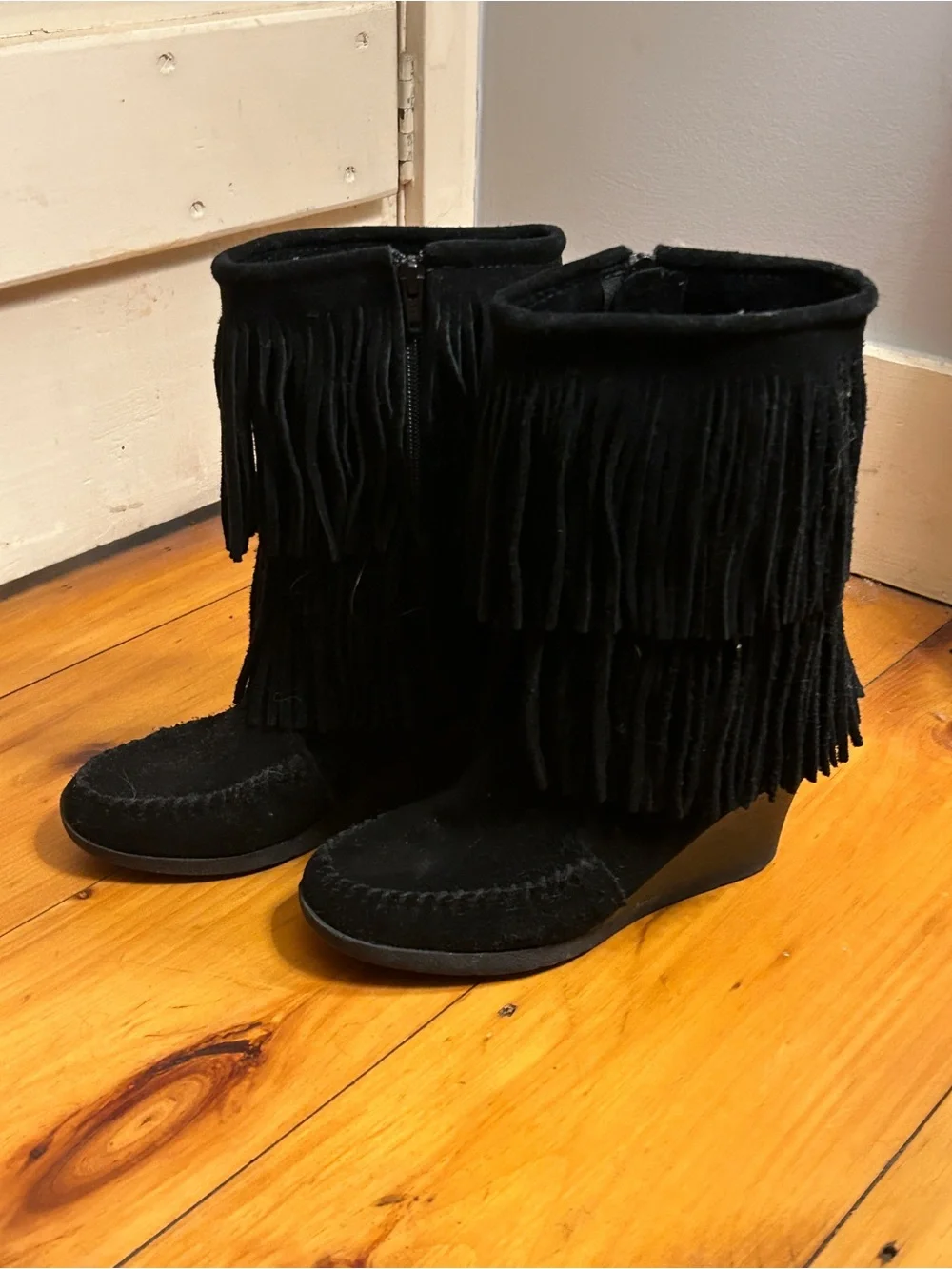Minnetonka Black Suede Fringe Wedge Boots